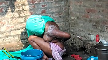 Desi Village Babe Radhika’s Steamy Outdoor Bath In Hindi
