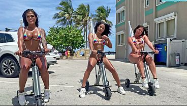 Thick Latina Babes Ride Electric Trikes On The Beach, Showing Off Their Juicy Booties