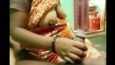 Indian Aunty Strokes Young Boy’s Cock Until It’s Hard And Dripping